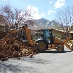 sewer excavation boulder